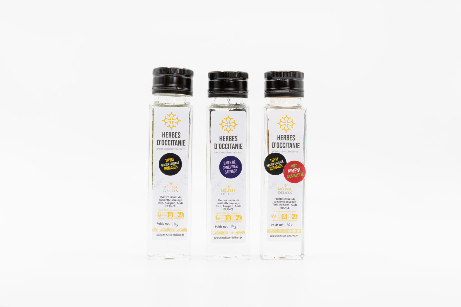 Packshot Mélisse Délices : trio de flacons d’herbes d’Occitanie